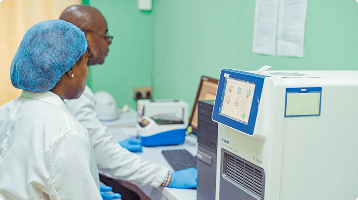 Niger Foundation Hospital researchers operating laboratory diagnostic equipment