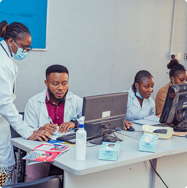 Clinicians at Niger Foundation Hospital reviewing patient data together